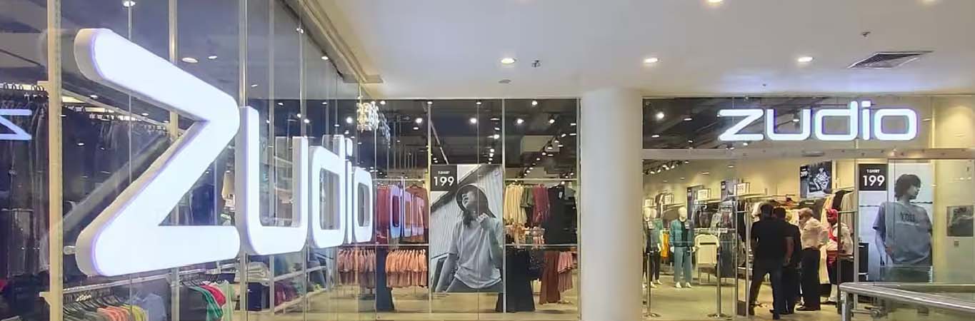 Clothing store interior with ceiling lighting and displays
