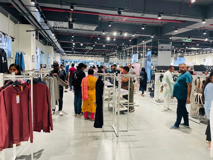 Retail store interior with apparel displays